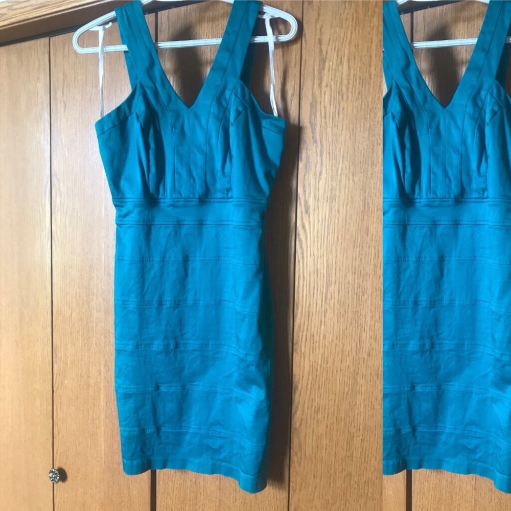 teal blue sleeveless dress.